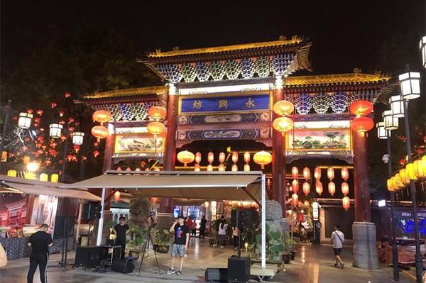西安回民街美食与永兴坊古建筑风格对比探秘
